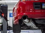 FOX Edelstahl-Abgasanlage ab Kat Toyota Supra MK4 JZA80 3.0 - 114 mm Endrohr - Endschalldaempfer und rundes Endrohr im Detail